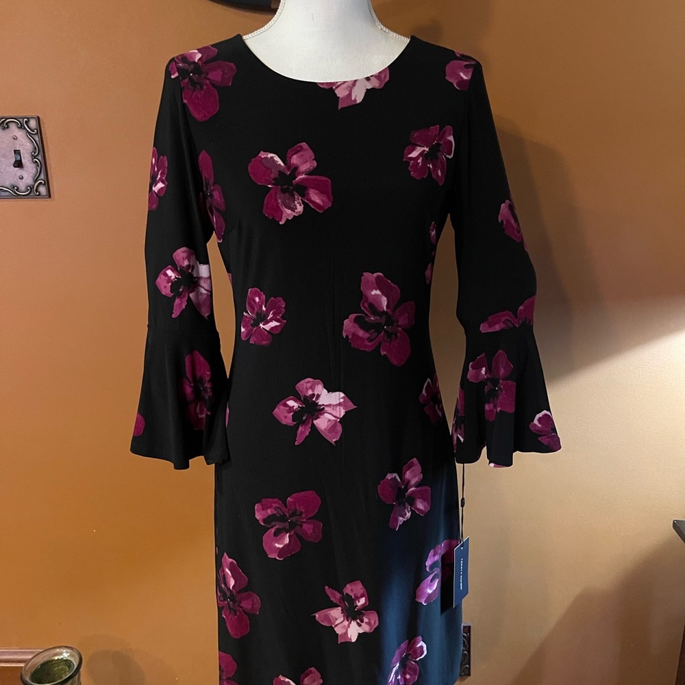 Brand new with tags Tommy Hilfiger dress with bell sleeves. Size 4!